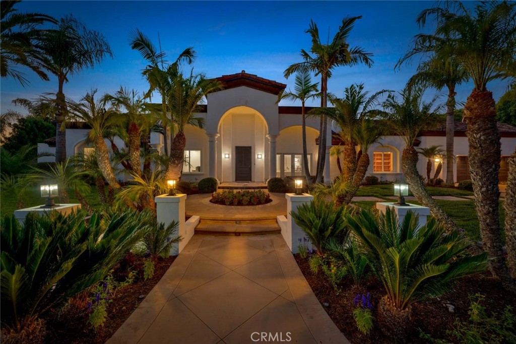Welcome to 18111 Dorchester Circle, a Sprawling Ranch Style Home Nestled on a Secluded Double Cul-de-Sac Street in the Heart of Villa Park. This Single-Level 4,043 Sq.Ft. Dream Home Includes Five Bedrooms (Fifth Bedroom is Currently Used as an Office), Dual Master Suites, RV Parking, New Interior and Exterior Paint, New Carpet, Travertine Floor, and Recessed Lights. Custom Upgrades Include Two Whole House Fans, Tankless Water Heater, Dual Pane Windows, and More! The Formal Living Room Includes a Wood-Beamed Vaulted Ceiling, Cozy Fireplace, French Doors to the Front Patio, and Opens to the Dining Room. The Gourmet Kitchen Features Granite Counters, Island, Tray Ceiling, Backyard Views Overlooking the Pool, Built-In SubZero Fridge, Commercial Viking Stove with Eight Burners, Viking Trash Compactor, New Dishwasher, Coffee Nook, and a Breakfast Nook with Backyard Access. The Spacious Family Room Includes a Vaulted Ceiling with Built-In Speakers and Large Picture Window Overlooking the Backyard Providing Maximum Natural Light. The Expansive Primary Suite Enjoys a Shiplap Vaulted Ceiling and Seating Area with Cozy Fireplace and Backyard Access. The Spa-Like Ensuite Bathroom Includes Dual Vanities, Makeup Vanity, Two Walk-In Closets with Built-In Organizers, Walk-In Shower, Soaking Tub, Sauna, Skylight, and Backyard Access. The Secondary Master Suite with En-Suite Bathroom and Walk-In Closet Sits on the Opposite Side of the House, Perfect for Guests or Multi-Generational Living. The Oversized Bonus Room Has Custom Built-In Shelving. Indoor Laundry Room with Built-In Cabinets and Direct Access Three Car Garage with New Carpet. The Resort-Style Backyard Features Complete Privacy, a Recently Remodeled PebbleTec Pool/Spa with Upgraded Phone-Controlled Pump, Large Grass Area, ½ Basketball Court, Bocce Ball Court, and Multiple Seating Areas. Short Drive to Santiago Oaks/Irvine/Peter’s Canyon Regional Park, Restaurants, Coffee Shops, and Horse/Hiking/Biking Trails. Easy Access to 55/91 Freeways and 241/261 Toll Roads. 18111 Dorchester Circle is a Must See!