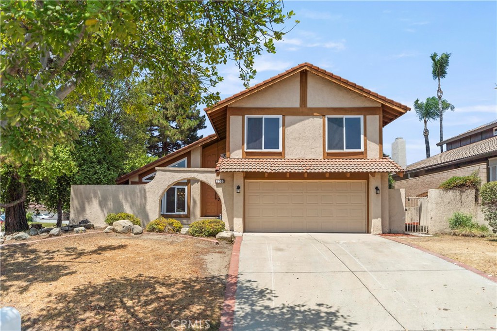 This fully remodeled corner-lot home in the City of Upland offers modern comfort and style. It features 1,927 sq ft of living space on an expansive nearly 9,000 sq ft lot, with 3 spacious bedrooms, 3 full bathrooms—including one downstairs with a shower—a versatile bonus room, and a loft perfect for a home office or creative retreat. The home offers both a formal living room and a cozy family room with a fireplace, creating ideal spaces for relaxing and entertaining. Inside, you’ll find soaring cathedral ceilings in the living and dining areas, a brand-new kitchen with new appliances, sleek new flooring throughout, fresh interior paint, new recessed lighting, and existing dual-pane windows for added energy efficiency. All bedrooms and the den are upstairs, offering privacy and flexibility. Additional features include new outdoor lighting in both the front and backyard, a two-car garage, and a driveway for extra parking. The spacious backyard offers endless potential—you can add an ADU, build a pool, create a beautiful outdoor entertainment area, or plant your own fruit trees and garden. Located in a top-rated school district—Pioneer Junior High and Upland High—and just 5 minutes from Whole Foods and local parks, this move-in-ready home is a must-see.
