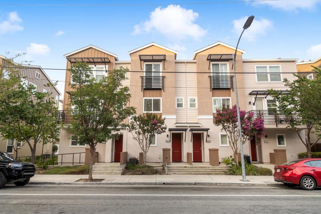 First time on the market! Single-owner starter property with incredibly low HOA adjacent to Japantown. Primary floor showcases rich walnut floors throughout with recessed lighting and bright windows allowing ample natural light. Open kitchen includes custom cabinetry, luxurious quartz countertops, and a stainless steel appliance set complete with a gas range. Walk-out balcony for morning coffee or a microgarden. Half bath for easy entertainment. The top floor holds both bedrooms, a spacious guest bedroom with its own full bath in the hallway, and a hotel-like primary ensuite with dual vanities and a standing shower. Stacked washer and dryer in the hallway. Attached 2-car tandem garage with ample storage. Central A/C makes summers a breeze. The community features its own park-like greenbelt, secure USPS mail boxes, and bbq area. Centrally located - easy access to Highway 101, 87, Japantown, San Jose State University, and more.