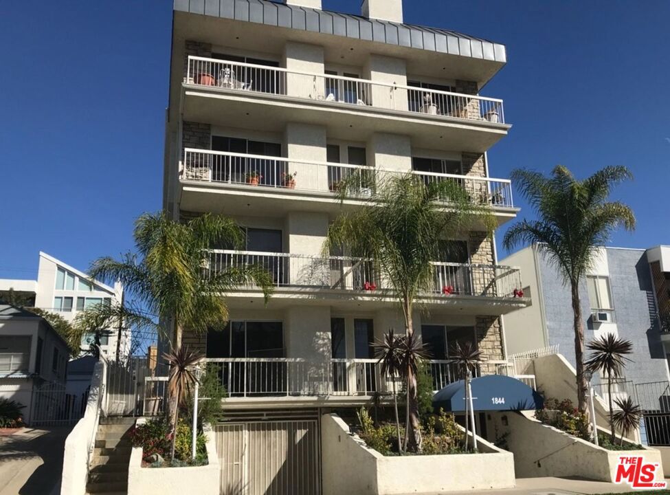 Welcome to this charming 2-bedroom, 2-bath apartment on the second floor of a seven-unit building, nestled in the heart of Century City on a quiet, tree-lined street. Enjoy a spacious balcony with serene neighborhood views, a secured lobby entrance, and key-access elevator for added convenience. The large master bedroom features an extra large closet, separate storage room, ceiling fan, and a large bathroom with a soaking tub, double sinks, granite countertops, and a beautifully tiled shower. The second bedroom offers ample closet space and a ceiling fan, with a guest bath. The spacious living room with a cozy gas fireplace flows into a separate dining area and a well-equipped kitchen with quartz countertops, tile floors, and stainless steel appliances. Additional highlights include wood-like flooring throughout, recessed lighting, central A/C and heat, an in-unit laundry room with washer and dryer, and two assigned parking spaces in a gated garage. Perfectly located near top shopping, dining, entertainment spots and everything the Century City vicinity has to offer!
