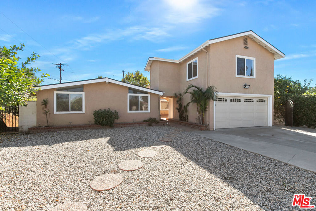 Beautiful 4 bedroom 2 bathroom home just North of Woodland Hills with a pool, outdoor kitchen and bonus room. Kitchen with stainless steel appliances, a center island and pantry opens up to living room and looks out to the back yard. Vaulted ceilings, master retreat with sliding glass doors leading to the back yard a bonus room attached (perfect office or den) and large remodeled bathroom with separate shower and tub.