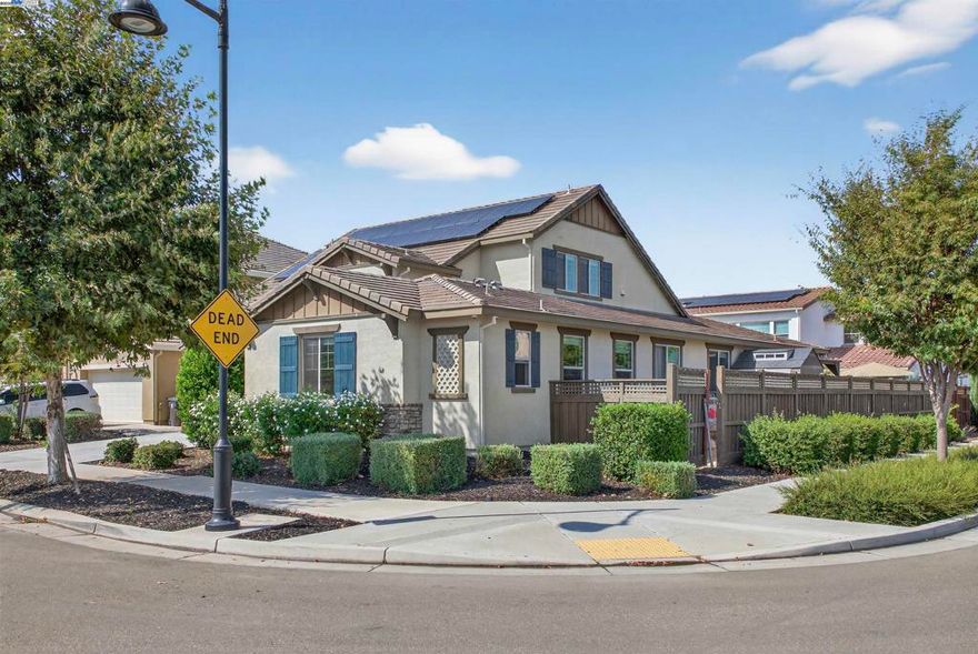 Welcome to an innovative living style in this Stunning home with 5 bedrooms and 4.5 bathrooms.The beauty begins with custom flooring throughout most of the house. The downstairs Kitchen features lots of cabinets, granite counters, a large island, gas stove, and pantry, and flows into the dining room and living room. Downstairs is a large master bedroom with a walk-in closet, dual sink vanity/storage, shower, and a large soaking tub. There are 2 additional bedrooms, with 1-1/2 baths, a laundry room with cabinets, and another dual sink vanity/storage, and linen closet. Downstairs also features a separate in-law unit with its own entrance,  bedroom, full bathroom, small walk-in closet, kitchenette, and living area. Upstairs you will find an oversized bedroom, 1 full bathroom, and a large loft. The backyard features a California room with recessed lighting, fireplace. The showpiece of the backyard is the Spool (spa/pool) gas heated, has a waterfall, 6 spa jets, and in-ground colors lighting. Great for backyard enjoyment all year long!. This property has OWNED Solar Panels. $150,000.00 in upgrades. Nestled in the Summer Homes area of River Islands Community, it has: 3-Elementary Schools, 1-high School, 10+ miles of walking trails, children parks, Lakes, Boathouse Rest. & Sports Areas