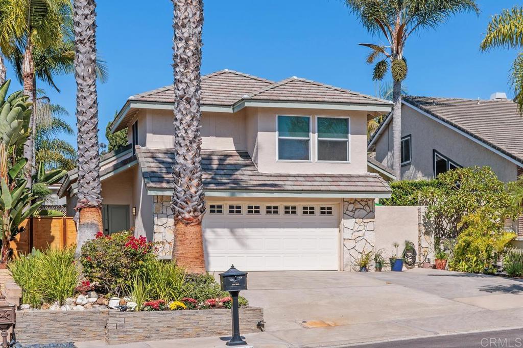 Stunning Designer Home with High-End Upgrades & Tropical Paradise Vibes, just minutes from the beach! Welcome to this beautifully updated home that blends luxury, comfort, and style with every detail thoughtfully curated. From the moment you enter, you're greeted by polished concrete floors that flow seamlessly throughout the spacious layout. The updated kitchen features a glass slider door to the swim/spa back yard and a 9’ la cantina door in the living room. Sleek stainless steel appliances, and designer finishes throughout the kitchen makes entertaining a breeze. Major upgrades include double hinged windows, new concrete tile roof 2023, a new furnace, and copper pipe plumbing through out for lasting peace of mind. The epoxy-finished garage floor adds a clean, modern touch, perfect for storage or a workshop. Step into your own tropical beachy paradise with a pool/swim spa, perfect for relaxing or staying active year-round. Inside, enjoy the warmth and ambiance of the impressive 31,000 BTU heated fireplace/furnace, creating the ultimate cozy living space. The primary bedroom offers lofted ceilings, a large walk-in closet, and a freestanding soaking tub that gives spa-like tranquility with a skylight. Designer touches throughout make this home truly one-of-a-kind. Enjoy the neighborhood park, sandy volleyball court and tennis courts and close to the award winning La Costa Heights Elementary School and La Costa Canyon High School. Don't miss your chance to own this stunning home with all the little extras — it's the perfect blend of style, substance, and serene outdoor living.