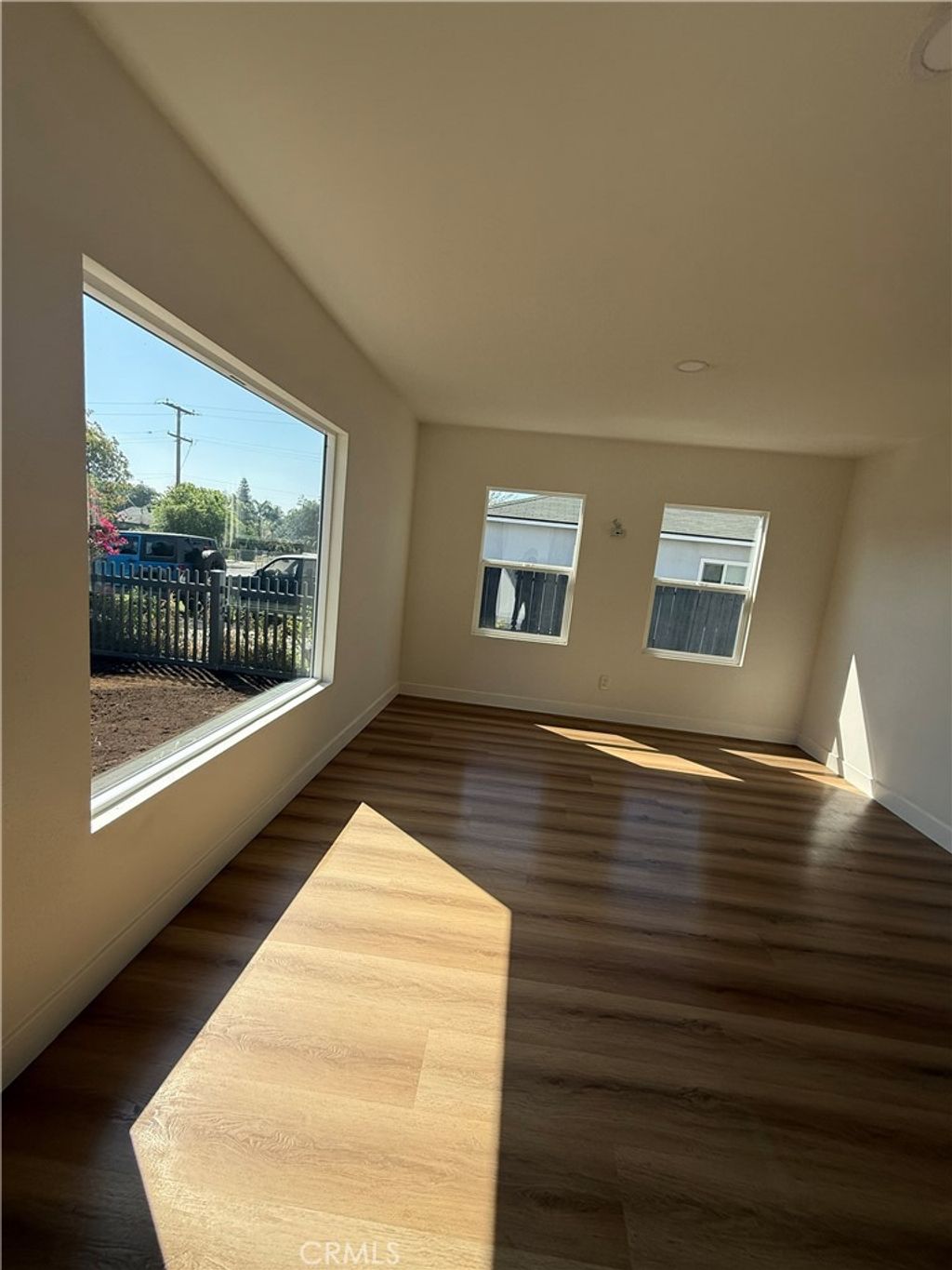 Photo of 527 N Cucamonga Avenue, Ontario, CA 91764 (MLS # SB26066005)