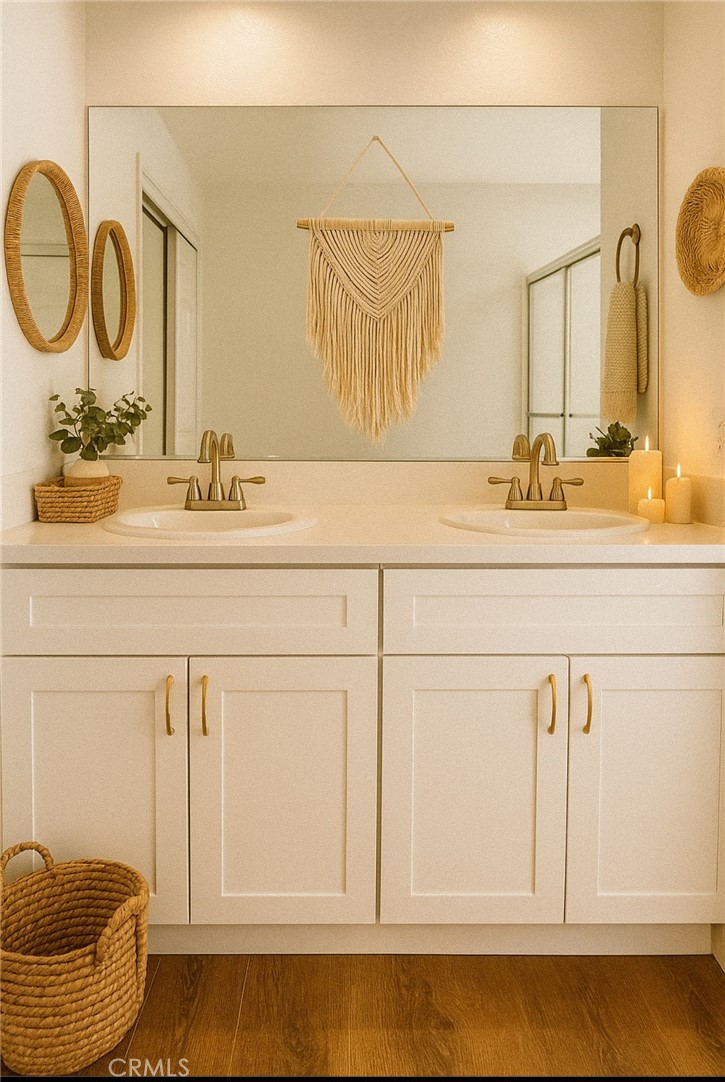 Escape to your own private garden villa--a beautifully refreshed 1 bedroom, 1 bath retreat featuring brand new wood floors, a spacious open living area, and a gourmet kitchen with new cabinetry and stainless steel appliances. Freshly painted and move-in ready, this home shines with recessed lighting and access to resort-style amenities including a sparkling pool, relaxing spa, recreation room and covered parking with storage.