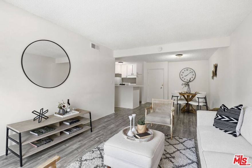Welcome to your bright and beautifully updated Tarzana retreat! This 2-bedroom, 2-bath upper-level condo offers a perfect blend of comfort, modern finishes, and convenience. Step inside to discover a spacious open-concept layout. The kitchen opens seamlessly to the dining and living areas making it ideal for entertaining or relaxing at home. Enjoy your morning coffee or unwind in the evening on your private balcony. The primary suite offers a serene escape with its own en-suite bathroom, while the second bedroom provides flexibility for guests, a home office, or creative space. Community features a pool, spa, and landscaped courtyards. Just moments from Ventura Blvd's best dining, shops, and cafes plus easy access to the 101 freeway, this condo truly offers style, comfort, and convenience in one package. HOA dues include water, trash, sewer, landscaping, pool and spa maintenance, building insurance, exterior maintenance, pest control, and professional management. Two parking spots (tandem) and storage.