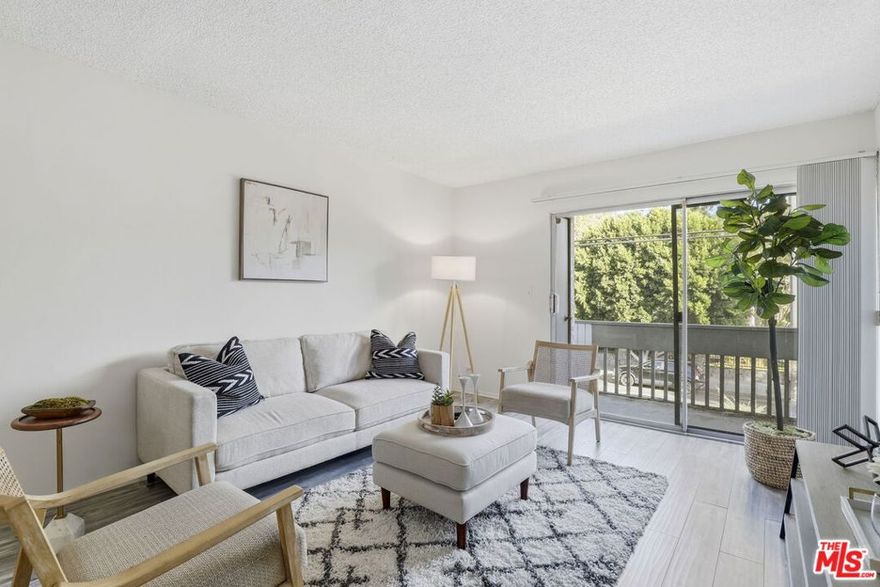 Welcome to your bright and beautifully updated Tarzana retreat! This 2-bedroom, 2-bath upper-level condo offers a perfect blend of comfort, modern finishes, and convenience. Step inside to discover a spacious open-concept layout. The kitchen opens seamlessly to the dining and living areas making it ideal for entertaining or relaxing at home. Enjoy your morning coffee or unwind in the evening on your private balcony. The primary suite offers a serene escape with its own en-suite bathroom, while the second bedroom provides flexibility for guests, a home office, or creative space. Community features a pool, spa, and landscaped courtyards. Just moments from Ventura Blvd's best dining, shops, and cafes plus easy access to the 101 freeway, this condo truly offers style, comfort, and convenience in one package. HOA dues include water, trash, sewer, landscaping, pool and spa maintenance, building insurance, exterior maintenance, pest control, and professional management. Two parking spots (tandem) and storage.