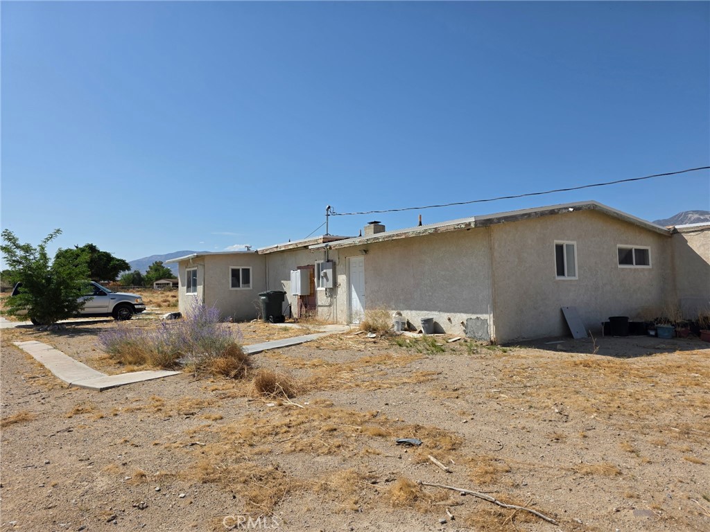 Bring your tools and roll up your sleeves because this approximate 4 bedroom, 3 bathroom home is full of potential and ready for your finishing touches. The interior is partially remodeled with a huge master suite, a large laundry room, and a spacious pantry or utility room right off the kitchen. There’s also a unique root cellar built into the ground that adds character and extra storage. The home started as a 2 bedroom, 2 bathroom and was expanded without permits, so buyers should verify all additions. The property includes its own water well and is fully fenced, offering privacy and room to make it your own. **CASH SALE ONLY** **CONDITION OF THE ROOT CELLAR IS UNKNOWN, PLEASE DO NOT ENTER FOR YOUR SAFETY.**