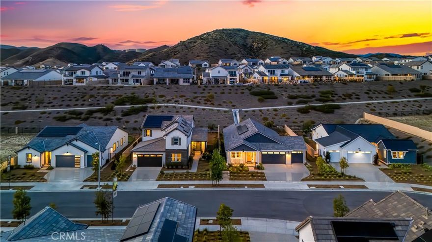 QUICK MOVE-IN HOME! Do not miss the Williams Homes BLUE TAG EVENT at Williams Ranch Community – our biggest incentives of the year 2025!

This home with STUNNING VIEWS is in the community of Williams Ranch, a rural setting just minutes to all the best shopping and dining Valencia has to offer. If you are sick of only being able to choose from high-density communities just for the sake of convenience, then Williams Ranch has what you are looking for! Enter through an operating vineyard and five acres of citrus orchards owned and operated by the HOA! Walk almost five miles of paseos or spend the day at the junior Olympic swimming pool complete with cabanas, wine pavilion, amphitheater, and club house, it will exceed your expectations! Also, just minutes from the crystal blue waters of Lake Castaic that offer swimming, water skiing, camping and more. Williams Ranch offers 9 pocket parks throughout the community and a large public park just outside the gates! This community offers the total lifestyle that you cannot find any place else! 

This spacious single-story dwelling offers panoramic view of the mountains, neighborhood, and a view of open blue skies! When you enter this beautiful home, the foyer leads to an extensive Family Room which is ideal for gathering and entertaining your loved ones! Through the Family Room you access the Outdoor room where you can take a break while working from home. There is ample parking space for cars and even a workbench with a 2-car garage + tandem. The main living area showcases a large kitchen with an expansive island that flows into a separate dining room. The secondary bedrooms and primary bedroom are conveniently located on opposite ends of the home for ultimate privacy. The primary bedroom offers a private bath with a huge walk-in closet. 

Please note that the pictures are of decorated Model Home Orchard collection - Plan 9 and the house does not include the option of R.V. garage. Call Williams Ranch Sales Office (661) 344-9200 for more detail information about our FLEX CASH INCENTIVE for this wonderful home!