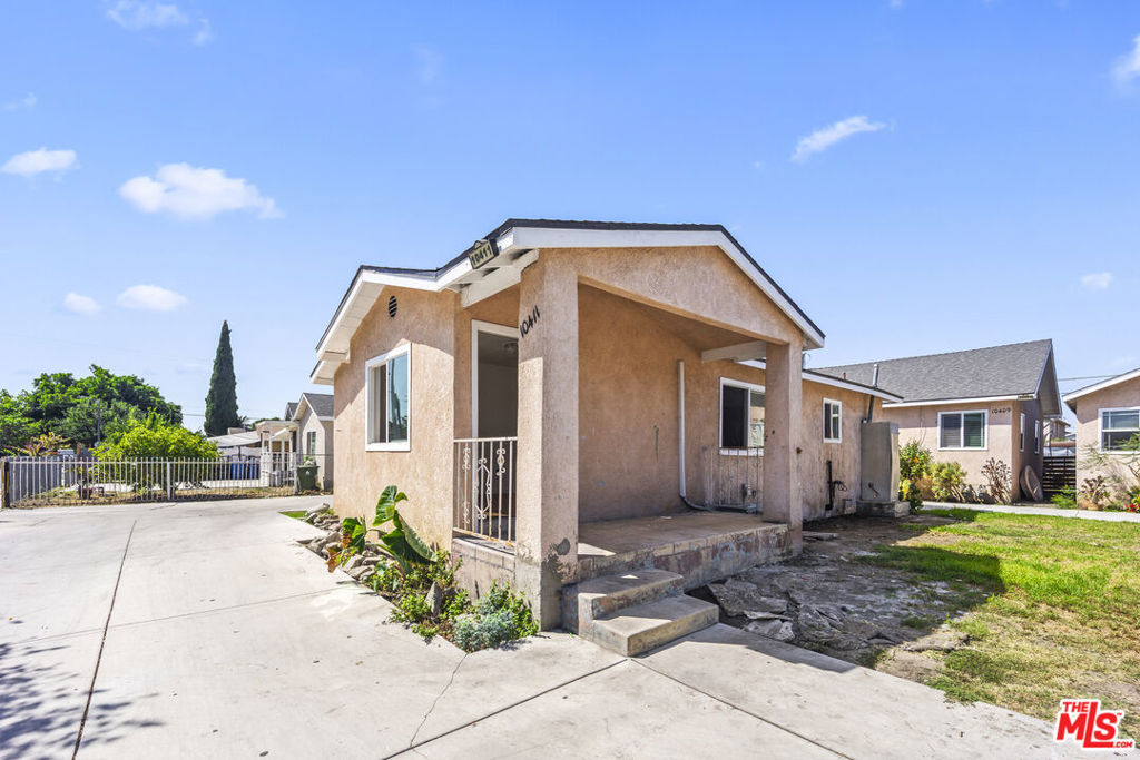 TRIPLEX ON A SINGLE FAMILY ZONING LOT! An extraordinary opportunity for the astute investor: this one-of-a-kind parcel spans 13,000 sq ft and offers three detached homes, each with its own address, all delivered vacant, plus a detached garage ready for ADU conversion. Located at 10407 Juniper Street (with additional unit addresses), this property blends immediate income potential, expansion opportunities, and strategic upside.Each home is a detached 2 bedroom / 1 bath residence: Unit A: ~568 sq ft Unit B: ~684 sq ft Unit C: ~1,058 sq ft. With ample yard and driveway space, parking is never an issue. The detached garage provides a blank canvas, primed for an ADU, and the sheer lot size opens the door to future expansion. Unmatched Development Potential: With three existing addresses and three by-right units, investors could explore adding up to three detached ADUs (buyer to verify). This could bring the total buildout potential to 6 rentable units, an incredible opportunity to maximize cash flow and long-term value. All homes will be delivered vacant, move-in or lease-up ready, making this a rare clean-slate offering. Whether you expand existing homes, activate ADU potential, or simply rent all three as-is, the layout and zoning create flexibility for both short-term yield and long-term appreciation. Prime Location: Just minutes from a brand-new shopping complex featuring Starbucks and other major retail anchors, the property sits in a high-demand pocket of Los Angeles with easy access to retail, transit, and community amenities ensuring steady rental demand and strong future upside. Don't miss this rare multi-unit, multi-address property in Los Angeles: immediate income, exceptional development potential, and a massive lot that sets the stage for the next great investment in your portfolio.