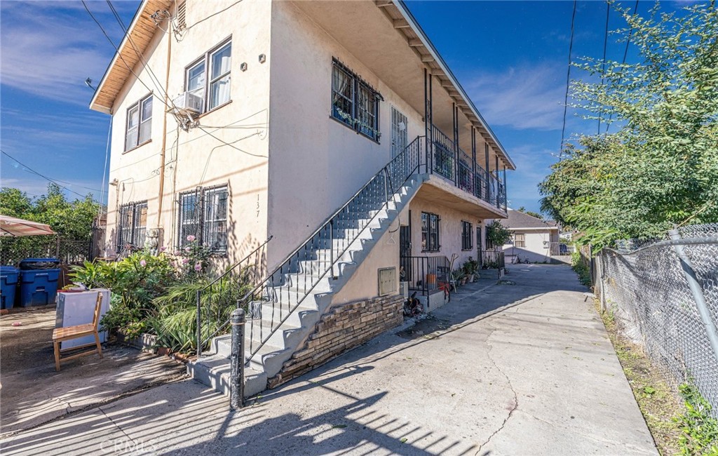 Great investment property for sale! This unique property includes three rental apartments and a separate house. It has two apartments with 2 bedrooms and 1 bathroom each, one apartment with 3 bedrooms and 2 bathrooms, and a 3-bedroom, 1-bathroom house located at the back of the property. It’s a great option for investors looking for steady rental income.