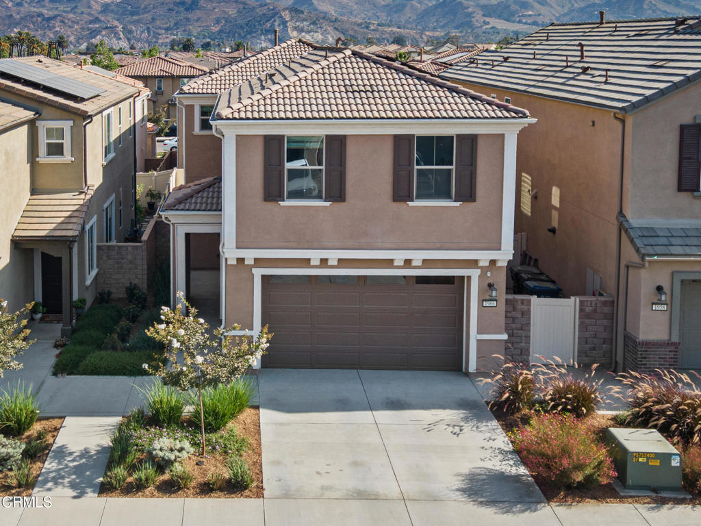 This almost-new 4-bedroom, 3.5-bath home was built in 2021 and sits in one of Santa Paula's nicest newer neighborhoods.It's light, bright, and open, with a layout that feels easy to live in. The kitchen is a great hangout spot with GE Profile stainless steel appliances, granite counters and a huge center island. There is also an alkaline drinking water system in the kitchen with a spigot at the sink. The main level also has a powder room and plenty of storage.Upstairs, the primary suite has a walk-in closet and a roomy bathroom with double sinks, lots of light, and an oversized shower. There are three more bedrooms and two full baths, plus the laundry room (with a washer and dryer) is right there where you need it.Out back is a low-maintenance yard with turf and a vinyl fence--ready for you to make it your own. The house also comes with a 2-car garage (with hanging storage racks) with direct access to the house, a FULL SIZED, 2-car driveway. and plenty of extra parking on the street! The solar system is another big bonus with super low monthly lease payments, which makes running the A/C guilt-free.The neighborhood has so much to offer - pools, a clubhouse, gym, sports fields, community gardens, and walking trails.If you're after a very nice, move-in-ready home with plenty of space and a great community feel, this one could be the one!
