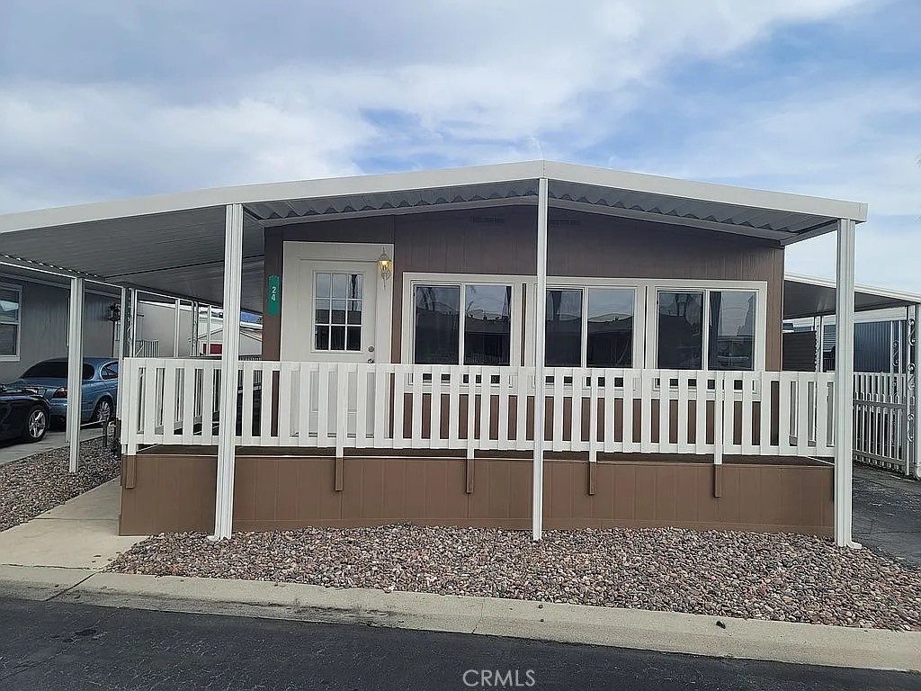 Move-In Ready 2 Bed | Fully Remodeled Double-Wide in 55+ Community
Welcome to Space 24, a beautifully upgraded and spacious 2-bedroom, 2-bathroom double-wide manufactured home, located on a desirable corner lot in a peaceful 55+ community.
Step inside to a bright and open layout with new vinyl plank flooring, dual-pane windows, and fresh modern finishes throughout. The fully remodeled kitchen is a chef’s delight, featuring brand-new cabinetry and new stainless steel appliances, including a refrigerator and stove.
The primary suite features a large walk-in closet and an updated private bath. The secondary bedroom offers ample closet space.
Enjoy easy access from the carport and relax on the large covered porch. The home is located in a well-maintained, friendly 55+ park that offers numerous amenities:
Community Features:
Heated swimming pool & indoor jacuzzi
Air-conditioned clubhouse with full kitchen & banquet room
Billiards, TV lounge & fitness room
Laundry facilities
Nightly security patrols (3x per night)
Pet-friendly areas and guest parking
proximity to shopping centers, dining, and medical facilities
Monthly space rent: \$825 | Financing Available
This home offers comfort, style, and a low-maintenance lifestyle—perfect for those looking to downsize without compromising quality. Schedule your private tour today!