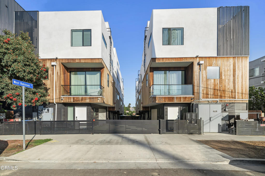 Introducing 3221 Robinson Lane, an end standalone multilevel modern residence in Silver Lake completed in 2023. With three bedrooms, 2.5 bathrooms, and approximately 1,738 square feet, this residence captures the essence of contemporary city living with dramatic views of downtown Los Angeles.The layout creates a striking balance of openness and privacy. Expansive windows showcase the skyline while bringing natural light into every level of the home. The open living and dining areas offer a refined yet welcoming environment, ideal for both elegant entertaining and relaxed daily living.The primary suite is a true retreat, featuring an oversized bedroom with a floor-to-ceiling window that frames natural light and skyline views, a spa-inspired bathroom, and a walk-in closet that feels like a private dressing space. Two additional bedrooms add flexibility, while 2.5 bathrooms are appointed with modern finishes throughout.Outdoor living is a highlight of this residence, with a balcony that frames dramatic skyline views and a fourth-floor deck located adjacent to the secondary bedrooms and bathroom. Together, these spaces create multiple options for morning coffee, open-air relaxation, or entertaining against the backdrop of the Los Angeles skyline. The residence also includes a private side yard, ideal for a dog run, gardening, or additional outdoor storage needs, adding further versatility to the property.With the advantages of new 2023 construction, this residence offers modern systems, efficiency, and reduced maintenance for peace of mind. Its Silver Lake address provides unmatched access to Virgil Village and Sunset Junction, both celebrated for their cafes, dining, and cultural atmosphere, while downtown Los Angeles remains only moments away.3221 Robinson Lane is more than a home, it is an exceptional opportunity to own an end standalone multilevel modern residence that combines refined design, contemporary living, and a prime Silver Lake location.