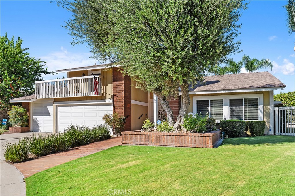 This charming home is hitting the market for the first time since 1972! Lovingly cared for by the original owner, this lovely 4-bedroom, 3-bath home offers 2,458 sq ft of comfortable living space on a peaceful, private 1/3-acre cul-de-sac in the highly sought-after Orange (92867) neighborhood. The thoughtful floor plan includes a formal living and dining area with a cozy fireplace, a welcoming family room with its own fireplace, and a convenient bedroom with a full bath downstairs. The spacious kitchen provides a perfect view of the gorgeous backyard. Step outside into your personal oasis featuring a resort-style pool with a diving board and slide, mature landscaping, and plenty of patio space for relaxing or entertaining. All bedrooms are generously sized, with a downstairs bedroom that’s ideal for guests. Pride of ownership shines through in every corner. Located close to top-rated Villa Park schools, parks, shopping, and dining, with quick access to freeways. This unique oversized lot, kept in the loving hands of the original owner, beautifully combines timeless charm with space, comfort, and endless possibilities.