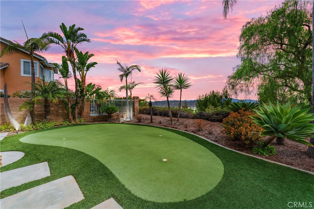 VIEWS! VIEWS! UNOBSTRUCTED PANORAMIC VIEWS! Doesn't get any better than this! Welcome to this 2900 sq. ft. Exquisite home Located in the Prestigious Neighborhood of Summit Springs in Anaheim Hills. This expansive 4 Bedroom 4 Bath home includes a versatile loft area perfect for a home office, playroom or tv lounge.
Enjoy a chef's dream kitchen with modern upgrades and Breathtaking Unobstructed Views of City Lights and Snow Capped mountains in those winter months. Cozy up by the fireplace in the oversized family room or retreat to the master suite featuring its own sitting area with a second fireplace.
You will also find 3 additional secondary bedrooms, one with its private ensuite and the other 2 with a large bathroom in between the fairly appointed large sized secondary bedrooms. Lush landscaping and your own private putting green surrounds the property and invites you to enjoy a private serene backyard to take in the views!
Don't miss out on this incredible opportunity to make this your dream home oasis in the Beautiful, Prestigious neighborhood of Summit Springs in Anaheim Hills with one of the most desirable School Districts! WELCOME HOME!