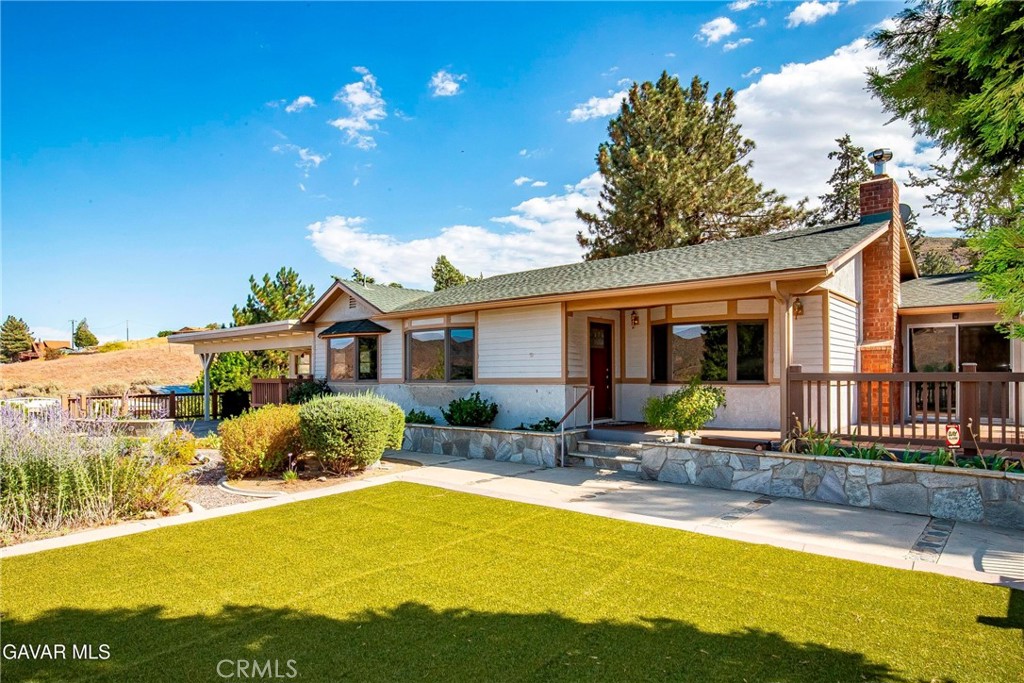 CUSTOM HOME ON 2.5 AC*AMAZING VIEW*PAVED STREET*DETACHED GUEST HOUSE*ATTACHED GARAGE PLUS SEPARATE WORKSHOP*PLUS LARGE TOY GARAGE**IN SERENE LEONA VALLEY! This Lovely Home is Warm and Inviting. It was built to take advantage of the View. You'll love the Open Floorplan with a Cozy Brick Fireplace with insert in the Living Room and a Wood Stove in the Family Room. The Kitchen has lots of Cabinets and Counter space with Corian Tops. The Kitchen flows into the Dining room and Living Room. The Master features 3 Closets. Ona a large Walkin Closet with Mirrored Doors and an Ensuite Bath. One bedroom would make an excellent office as it has great builtins. The Laundry Room is roomy with plenty of storage and. Over the years owners replaced almost everything including adding Anderson Metal Clad Wood Windows, Custom Doors and Cabinets with some Lovely Stained Glass, Bamboo Flooring, Remodeled Bathroom, Trex Deck, both Roofs Replaced 2019 and much more. The Deck is perfect as Outdoor Living Space. Enjoy your Lovely Garden and the Peaceful View. Attached to the house is a Roomy Garage plus a Separate Workshop. There is a detached Guest Home with a Kitchen and a Bathroom. A concrete Driveway leads to an RV/Toy Garage in the back. There are also Horse Facilities. Corrals, Tack Room and Shelters. You'll appreciate the concrete Circular Driveway, the Flagstone Accents, the Mature Trees and all of the Extra Land in the back. So many possibilities.