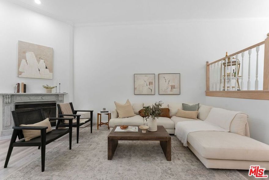 Located in a coveted Westside neighborhood, this tastefully remodeled tri-level townhome features 2 bedrooms and 3 bathrooms within 1,516 square feet of airy, open-concept living. Step inside and be captivated by the high ceilings in the living room, and a bright kitchen outfitted with stainless steel appliances and quartz countertops. A passthrough connects the kitchen to a delightful dining area, perfect for hosting lively dinner parties,  which flows effortlessly to a spacious balcony ideal for barbecuing and sunset cocktails. Both bedrooms come with en-suite bathrooms, with the primary suite offering a generous walk-in closet, cathedral ceilings, a fireplace and its own balcony.  The property includes a double attached garage which has been expanded to easily accommodate 2 larger cars and comes with direct access and a gated driveway. This well-maintained 12-unit complex is conveniently located within walking distance to the lively dining and shopping options along Sawtelle, Santa Monica Blvd. and Olympic. Craving gourmet groceries? The new Gelson's, Trader Joe's and Whole Foods are practically at your doorstep. Additionally, it is situated near the 10 and 405 freeways and across from the Stoner Recreation Center, offering easy access to sports, fitness programs, the Stoner Park Pool, along with other amenities. This stylish home is your gateway to the best of Westside living, where convenience, comfort and excitement converge!