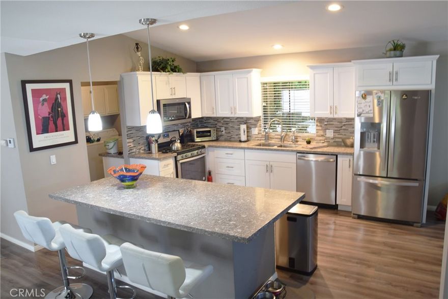 NO rent, NO lease, just pure ownership!
AND HIGH VAULTED CEILINGS AS IN NO OTHER! SPACIOUS!
This home is located in a 55+ senior community.

HOME: Looking for a slice of paradise without breaking the bank? Beautiful Home Completely Renovated with NEW ROOF 2024,  Newer Air Conditioner, Drywalled and Newer Plumbing, make this A Must See on your list !!! Large Bedroom with VAULTED ceilings, Bath Custom Soaking Tub, all newer fixtures and a Newer Tiled Shower, The Chef’s Kitchen is OPEN and Spacious, GREAT FOR ENTERTAINING and a Cozy Fireplace for Ambiance.

INTERIOR: With an open floor plan, this is a great home for entertaining family and friends. The ceilings in the great room are VAULTED with Stylish touches like recessed lighting, newer flooring, revamped bathrooms, and a gorgeous kitchen with like-new appliances make this place feel like a breath of fresh air. Home has been updated and shows very well with a large center island with plenty of drawers for storage and soft close cabinets.

HOA AMMENTIES ONLY $400 monthly: Imagine having full cable TV, internet, trash service worth over $200 alone! Plus, unlimited free Golfing (18 hole executive golf course and PRO shop) for all owners! It’s like living at a resort, but without the hefty price tag. The community Clubhouse, Restaurant, lounge, 3 pools/spas with one for families fitness center, also has tennis & pickleball courts, bocci ball area, shuffleboard (indoors), billiard, card room, recreation room, bar and banquet room and a library along with more than 30 social clubs making this a desert JEWEL!.

SECURITY: 24 hr security gate with roving patrols. Peace of mind whether your home or away! Call in any guest, it’s easy.

FINANCING: A PLUS, with a permanent foundation already in place, financing this gem is a breeze. We can help.

OPEN HOUSE: December 6-7, from 10-4:30pm, COME VISIT one of the best homes in Palm Desert Greens!

Don’t miss out on this incredible opportunity! OR schedule your private showing today and discover what makes this property so special. You won’t regret it!