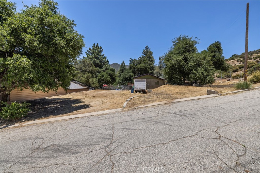 Buildable land parcel in a residential neighborhood. Being sold with listing SR25141919.