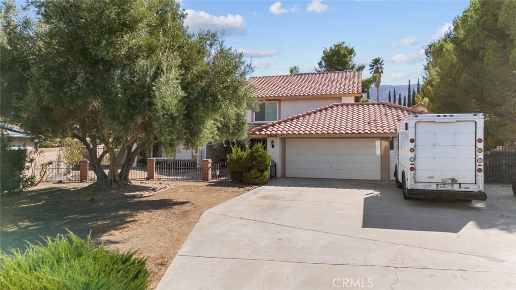 Welcome to 6348 Theodore Court, a stunning two-story single-family home nestled in the highly desirable Quartz Hill neighborhood. Situated on over half an acre (25,282 sq. ft. lot), this 4-bedroom, 3-bath residence offers 2,810 sq. ft. of comfortable living space with plenty of room to entertain both indoors and out.
Once inside, a spacious living room highlighted by a cozy fireplace, perfect for gathering with family and friends. The oversized kitchen is a chef's delight, featuring custom built-in cabinetry, granite countertops, and an open layout that flows seamlessly into the dining area. A dedicated laundry room adds convenience and functionality.
Retreat to the luxurious primary suite, complete with dual sinks, a relaxing soaking tub, a separate walk-in shower with elegant tile, and ample closet space. Secondary bedrooms are generously sized, ideal for family, guests, or a home office.
The backyard is your private oasis, boasting a sparkling custom pool and endless space to create your dream outdoor retreat. The property also includes an attached garage with built-in cabinets for organized storage.
Located in one of Quartz Hill's most desirable areas, this home combines comfort, style, and the perfect setting for California living.