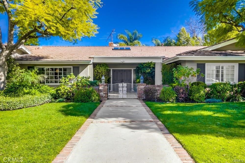Beautiful one story home South of Ventura Boulevard on a cul-de-sac in the heart of Encino. This five bedroom home includes a custom kitchen with two islands that open up to your family room with built-in cabinets and television. Formal dining room with butler's pantry and light and bright living room also with built-in cabinetry. There is a primary suite with a remodeled bathroom and two large closets. Four bedrooms are on one side of the house and one bedroom and bathroom are on the opposite side of the house making it a great guest suite or office. There are french doors across the back of the house that open to a private and beautiful backyard with a fantastic outdoor kitchen, pergola, pool and spa as well as a grass area. Truly a special home A must see!
