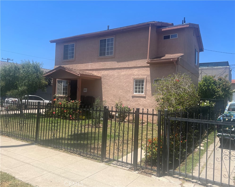 Incredible Opportunity – Two Homes on One Lot!
Live in one and rent the other for extra income or extended family living. A perfect setup for homeowners or savvy investors!
The main front home is a two-story residence offering versatile living space. The first floor features: Two comfortable bedrooms. One full bathroom and a convenient half-bath. A functional kitchen and dining area with decorative nonworking fire place. In-unit laundry for added convenience. Upstairs, you'll find a second full bathroom: A spacious sized third bedroom, and a bright and airy living room. The second unit is a private, detached 1-bedroom, 1-bath home, living room. Long driveway, detached 2-car garage, cozy back patio. Located near the 405 Freeway, LAX, shops, restaurants, SoFi Stadium, and Dockweiler Beach, this property offers both comfort and convenience. A must-see with endless potential!