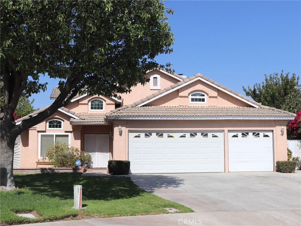 Welcome to this beautifully maintained 4-bedroom, 3-bath home located at the end of a quiet cul-de-sac in Jurupa Valley. This spacious two-story property features an open floor, bright living room with fireplace, a functional kitchen with included appliances, and a balcony overlooking the backyard. Enjoy year-round comfort with central heat and A/C, plus a 3-car garage with laundry hookups and extra storage. The backyard provides plenty of room for entertaining or gardening, enjoy sitting in the jacuzzi with scenic mountain views as a backdrop. Conveniently located in the Rubidoux area near schools, parks, and community amenities, this move-in ready home combines comfort, functionality, and location — all at a great value!
