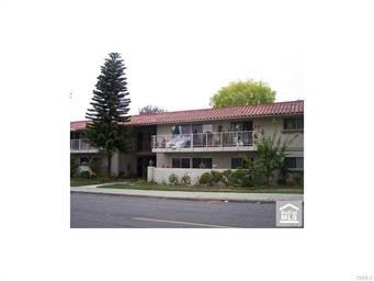 Lovely Two Bedroom, 2 Bath unit. Quiet location. Stainless Steel Dishwasher and Refrigerator. Laminate flooring, with carpet in 2nd bedroom. 2nd bedroom has a Murphy bed, desk, and shelves for your convenience. 2nd bedroom also has sliding glass doors leading out to a large private patio. Nice size living room for relaxing, watching T.V., entertaining etc. The electric portable fireplace is included and can be put in the room of your choice. Washer/dryer in unit. Park in front of the building and walk into the home. Laguna Woods is an active 55+ community with amenities to fill your day. Tennis anyone? Pickleball, Heated swimming pools, jacuzzi, woodworking shop, jewelry making, duplicate bridge, lapidery, ceramics, golf, driving range, photography, p.c and mac room, table tennis, paddle tennis, bocce ball, equestrian center, and over 200 clubs to join. Close to shopping, restaurants, and medical facilities. Approximately 8 miles to Laguna Beach. Make This Your Next Home