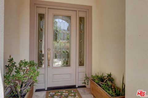 Photo of 23863 Erin Place, West Hills, CA 91304 (MLS # 26829981)