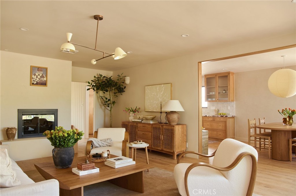 Welcome to “The Meadows” - a hidden Altadena gem tucked in the hills, offering rare privacy, thoughtful design, and seamless indoor-outdoor living. You’ll know you’ve arrived as you wind past the forested road and ascend the scenic turn - the views alone will take your breath away. No other neighborhood in Altadena compares. With higher elevations and direct access to some of the area’s best hiking trails, The Meadows invites you to make the hillside your personal playground. For families, the recently rebuilt neighborhood park (Alta Loma Park), one of Altadena’s best, is just minutes away.
Inside, this beautifully renovated home blends timeless craftsmanship with an organic modern aesthetic. Highlights include:
Custom white oak cabinetry and built-ins, white oak floors, Handcrafted marble countertops and fluted vanities, Venetian plaster walls and range hood, Handmade tile backsplash, Italian appliances, a cozy coffee bar nook, Open-concept living and dining areas filled with natural light, Thoughtfully designed laundry and storage spaces with curated details,
Step outside to discover an equally stunning outdoor retreat featuring:
A Mediterranean-inspired drought-tolerant garden, Lush herb garden, olive trees, natural stone paths, A tranquil fountain, and shaded pergola seating. Generous space to gather, garden, and unwind - all framed by mature landscaping.
This isn’t just a home - it’s a lifestyle. Thoughtfully designed, effortlessly beautiful, and grounded in nature.
Schedule a private showing with your agent, or come experience it in person at our open house - this Altadena retreat is even better in person.
