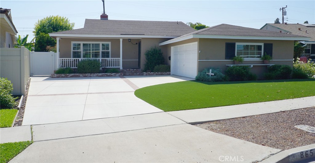 First time on the market is this stunning, remodeled and highly upgraded College Park Estates single family home. College Park Estates, built by S & S Construction, has stood the test of time, as one of the most highly regarded single family communities in East Long Beach. Situated on a quiet interior Cul-d-Sac street, 865 N. Karen Way features a stunning 3 Bedroom, 1-3/4 Bath single story home on a nearly 6200 square foot, lusciously landscaped lot. The kitchen has been totally remodeled with new cabinets, marble counters, hardware, an included stainless steel refrigerator, plus gas range/oven, dishwasher and microwave oven. The main bathroom has also been totally remodeled with new cabinets, marble counter, and to top it off, a Restoration-type tub with shower. The bath off of the 3rd. bedroom has also been remodeled with all newer appointments, plus a large walk-in shower. The 3rd. bedroom can easily be utilized as an office or study. Windows and doors have been upgraded with high quality dual pane windows, plantation shutters, and a sliding door off of the third bedroom. There is crown molding throughout, recessed lighting, a ceiling fan in the master, plus recently installed high quality laminate floors throughout. A new upgraded electrical panel has been installed to easily handle all of the electrical upgrades. The rear yard is absolutely gorgeously landscaped with a combination of mature trees and lush, well-manicured shrubs and lawn, surrounding the covered patio. The large 2-car garage has had a new concrete floor poured, and also the large sweeping driveway with some extra space for a small RV or boat. Of course College Park Estates is very convenient to Cal State Long Beach and is only a few miles from the Pacific Ocean, Alamitos Bay, Belmont Shore and the new major mall at the corner of PCH and Westminster Ave. Also convenient, but not too close, are 405, 605 and 22 freeways. This wonderful home has been in possession of the original family since new and is now turnkey ready for a new owner to share in years of enjoyment.