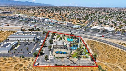 Photo of 12627 Mariposa Rd RD, Victorville, CA 92395 (MLS # PTP2603709)