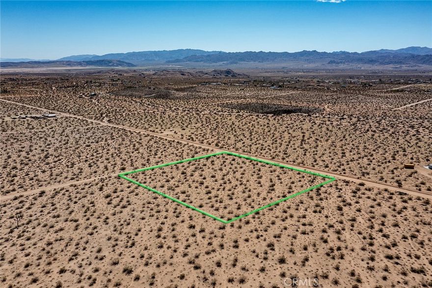 Escape to the desert with this 2.09-acre parcel in a quiet, rural area of North Joshua Tree, near Border Ave. This property offers breathtaking views of the Bartlett Mountain Range and plenty of open space to enjoy the peace and beauty of the desert. Perfect for those looking for a long-term investment or to create their own off-grid retreat, this parcel offers endless potential. If you’ve been dreaming of a desert getaway or future home site, this property is a great opportunity to make it a reality.