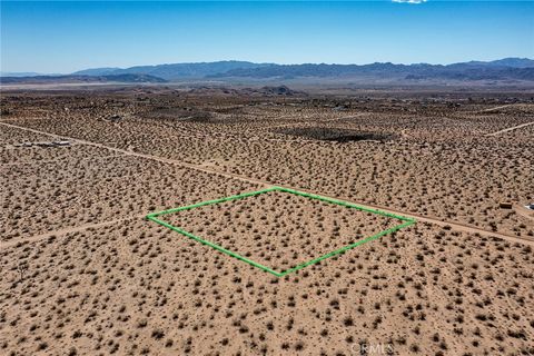 Photo of 0 Sunny Sands Drive, Joshua Tree, CA 92252 (MLS # SW25224146) Photo of 0 Sunny Sands Drive, Joshua Tree, CA 92252 (MLS # SW25224146)