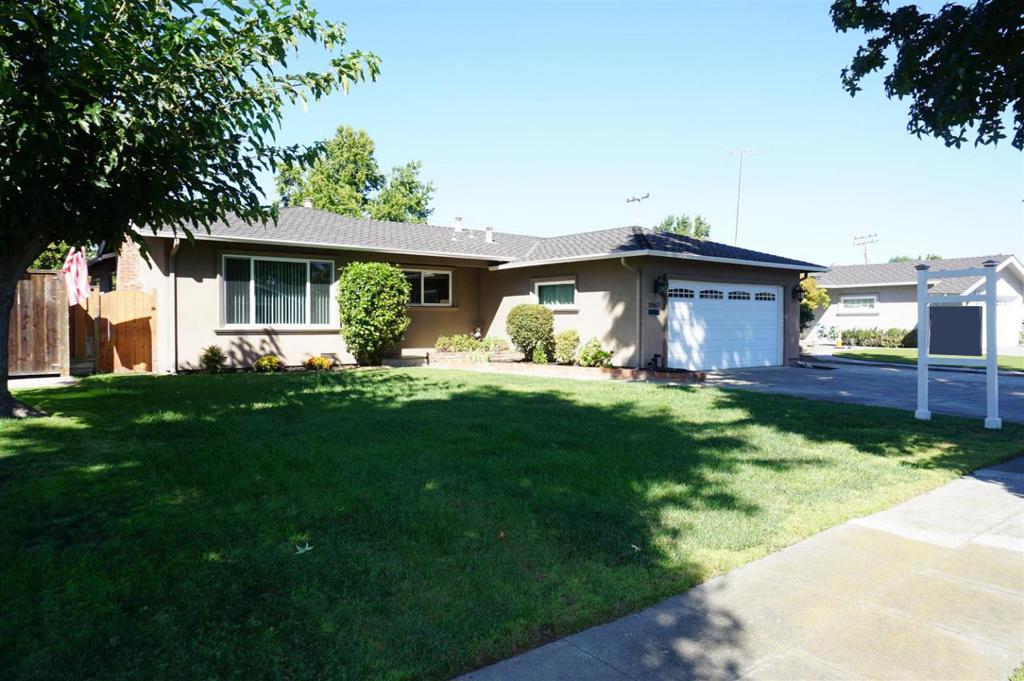 Discover a charming home in the vibrant city of San Jose, boasting 1,480 sq ft of comfortable living space. This welcoming residence features three bedrooms and two full bathrooms, including a primary bathroom with a stall shower and a second bathroom with a shower over tub, both adorned with tile finishes. The kitchen is thoughtfully equipped with modern amenities, including a tile countertop, dishwasher, garbage disposal, microwave, gas oven range, and refrigerator, making it perfect for culinary endeavors. Enjoy meals in the cozy eat-in kitchen or unwind in the separate family room, complete with a fireplace for those cooler evenings. The homes flooring includes a mix of carpet, hardwood, tile, and vinyl/linoleum, catering to diverse tastes. Laundry is conveniently located in the garage, with a washer and dryer included. The property falls within the Campbell Union Elementary School District. Additional features include ceiling fans for cooling and a two-car garage, ensuring ample space for vehicles and storage.