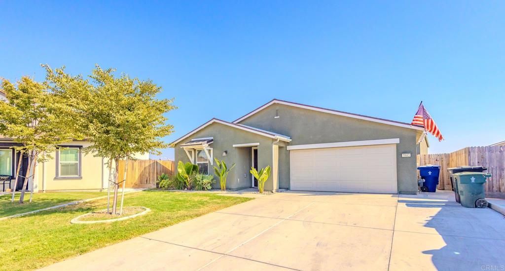 Modern luxury meets everyday comfort in this stunning 4-bed, 3-bath Bakersfield home! Built in 2022, it features an open-concept layout, quartz countertops, stainless-steel appliances, and elegant wood-look tile floors. Enjoy low energy bills with solar panels and relax in your spacious primary suite with a spa-style bath. The backyard is a blank canvas ready for your dream setup. Located near great schools, shopping, and parks — this move-in-ready home truly has it all!