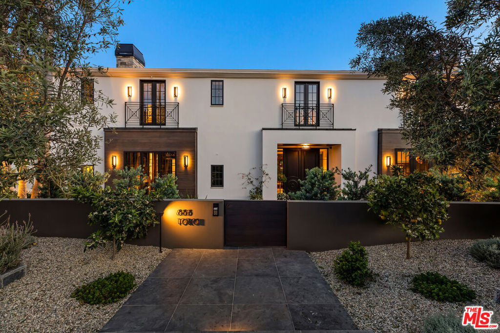Welcome to this extraordinary home in the highly desirable Riviera Palisades neighborhood. Crafted with meticulous detail and designed by Maryl Georgi, this bespoke residence showcases superb quality and recently underwent a complete renovation leaving no detail untouched. Situated on a corner 1/3 acre parcel with no neighbors on 2 sides this home has ultimate privacy with its fully enclosed and lushly hedged landscaping and gated entry. Spanning 3 levels which are all accessed by a beautifully paneled elevator connecting each floor. As you enter the main level the elegant entrance welcomes you and features a Bleu Chinois aged limestone floor which sets the tone for the luxurious atmosphere throughout. The Wainscot paneled living room has European oak hardwood floors and highlighted by a marble fireplace. French doors open and reveal the private and sunny pool and spa area. There is a library with another fireplace, elegant wood paneling, coffered ceilings, and French windows that frame the view of dramatic Koi and turtle pond. The powder room off the entry retains the same floors as the entry and features a unique petrified wood sink pedestal. There is a second powder room off the kitchen/family area. The kitchen is a haven of light and quality with top of the line appliances including a Blue Star range and oven, separate Sub Zero fridge and freezer, Sub Zero wine fridge, warming drawer, 2 dishwasher drawers, Miele dishwasher, Paonazzo marble countertops and walnut chopping block on the center island. There is separate pantry and butlers pantry to the dining room. Adjacent to the kitchen is a sunlit breakfast room. This all opens to a family room with another fireplace, 300 bottle wine wall, large screen tv, a stylish bar with brass accents that opens with French doors to a fantastic outdoor area which has a lounging area, grassy yard, water wall and built in pizza oven and rotisserie. Moving upstairs the primary has another fireplace, walls of French windows and doors with electronic shades and curtains and a balcony with views of Riviera CC and peek-a-boo ocean view. There are two bathrooms plus two sitting rooms. The other 2 en-suite bedrooms on this level have balconies and French doors. A huge upper landing can be a second living room or office. Down to the lower level to find a 4th en-suite bedroom with a separate area which could be a gym or office, a 10 seat theater and a laundry room with double washers and dryers. Completing the home is a 1000 sq. ft. 3 car garage plus off street parking for another 5 or more cars. And yet there is so much more detail. This is a very special home unlike the cookie cutter homes you are used to seeing. Also for lease at $69,500.