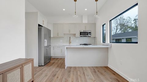 Photo of 12752 Martha Ann Dr, Los Alamitos, CA 90720 (MLS # NP26072124)