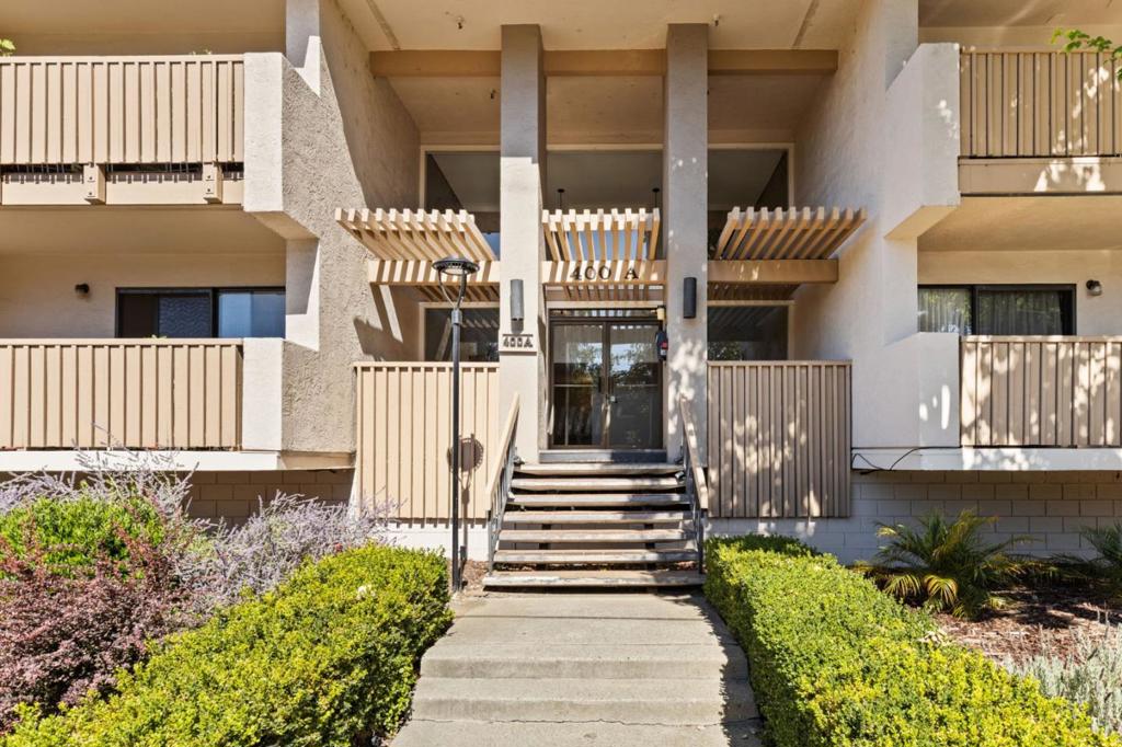 Experience modern living and stylish comfort of this newly remodeled condo in a secured building with elevator. With friendly neighbors,highly rated Los Altos schools and a vibrant community, this home is perfect for modern, connected living in Mountain View. Abundant natural light highlights the sleek interiors. The cozy living area features a fireplace, while the kitchen offers contemporary convenience. Enjoy the in-unit washer and dryer, plus ample storage, including a walk-in closet in the primary bedroom, coat and linen closets and additional spaces in the common storage area. Updates include recessed lights, new carpet, baseboards and interior painting, and the luxurious bathroom with bidet. Stay connected with Ethernet wiring and fiber internet for high-speed connectivity. The AV hidden cable design ensures a clean TV setup. Community amenities include a pool, clubhouse, and BBQ area. A park across the street offers a pleasant outdoor retreat. Two assigned parking spaces underground and ample guest parking add convenience. This location is ideal for those who value accessibility: a short walk to grocery stores, restaurants, and banks, with public transportation options and office shuttle pickups nearby. Downtown Mountain View is just a quick drive away.