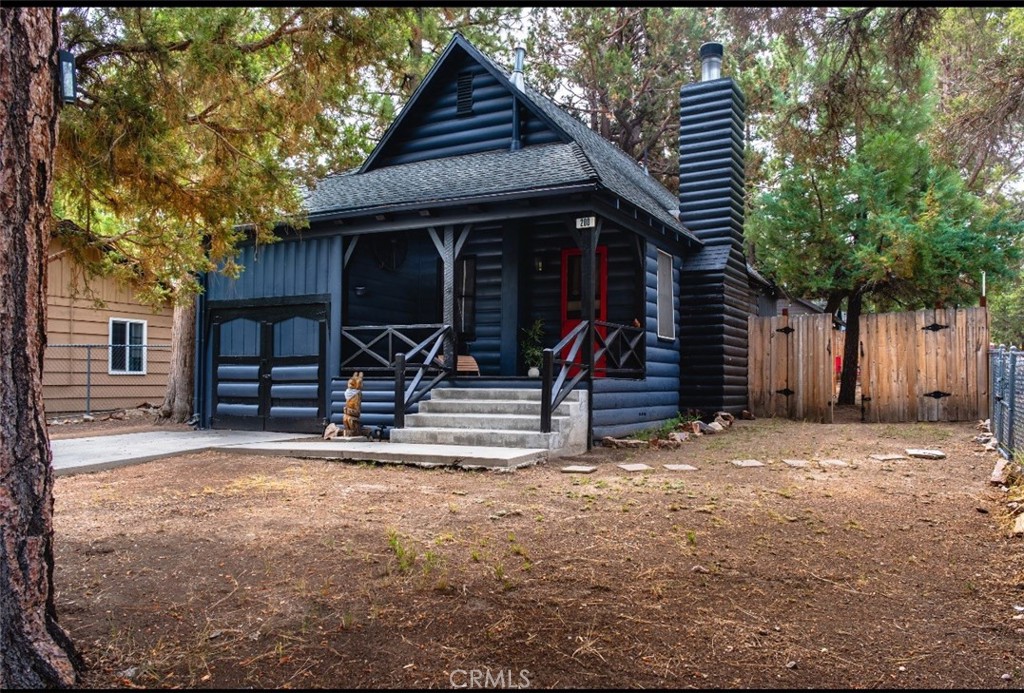 Step into this sweet and cozy cabin in the Big Bear woods. This one-bedroom, one-bathroom retreat sits on a desirable corner lot, offering added privacy and natural light. Perfect as a full-time home or a charming rental property, it’s just minutes from The Village and countless outdoor adventures—hiking, skiing, kayaking, snowboarding, and more. A bonus room provides flexible use as a guest space, office, or creative retreat (buyer to verify permits).