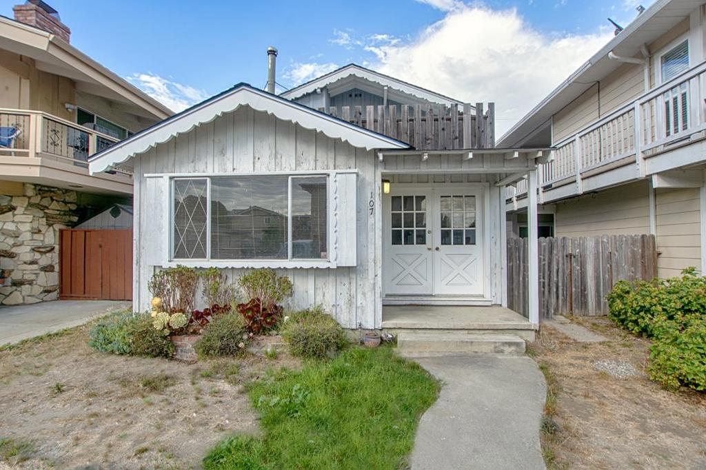 Just four blocks from the beach, this fixer-upper beach cottage is brimming with potential! With a little vision and creativity, this small but charming home could be transformed into the perfect coastal getaway or a cozy full-time residence. The property features ocean peeks from the second-story deck, making it easy to soak in the fresh sea air and coastal vibe. Located in a sweet, sought-after neighborhood, you'll love the easy stroll to the beach, local cafes, and favorite seaside spots. Though the house needs significant TLC, it offers the perfect blank canvas for someone ready to create their dream retreat. Whether youre seeking a weekend escape, a rental opportunity, or a full-time beach lifestyle, this cottage has the location, potential, and charm to make it all possible. Dont miss this rare chance to reimagine a beachside gem just steps from the sand.