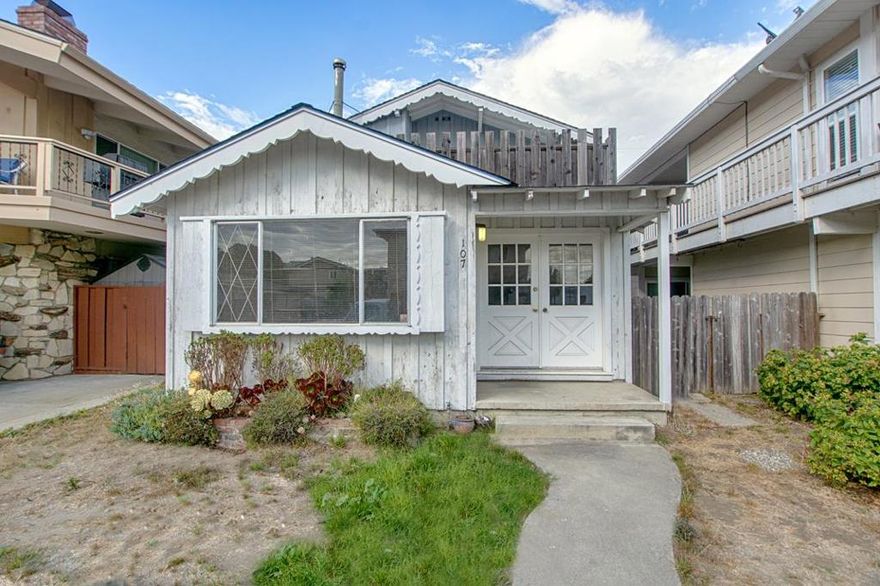 Just four blocks from the beach, this fixer-upper beach cottage is brimming with potential! With a little vision and creativity, this small but charming home could be transformed into the perfect coastal getaway or a cozy full-time residence. The property features ocean peeks from the second-story deck, making it easy to soak in the fresh sea air and coastal vibe. Located in a sweet, sought-after neighborhood, you'll love the easy stroll to the beach, local cafes, and favorite seaside spots. Though the house needs significant TLC, it offers the perfect blank canvas for someone ready to create their dream retreat. Whether youre seeking a weekend escape, a rental opportunity, or a full-time beach lifestyle, this cottage has the location, potential, and charm to make it all possible. Dont miss this rare chance to reimagine a beachside gem just steps from the sand.