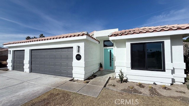 UNFURNISHED LEASE AVAILABLE IMMEDIATE MOVE-IN! Luxurious, designer remodeled 3 bedroom/2 bath view home in Cathedral City just seconds from Palm Springs. Tucked away on a tranquil cul-de-sac street, this home offers generous living space with a top-of-the-line modern design. The huge kitchen showcases elegant white shaker cabinets, Calcutta queen counters, marble tile backsplash, a huge walk-in pantry and a premium stainless steel GE appliance package, including a convention and air-fry range, dishwasher, microwave, and counter-depth refrigerator. In addition, there's a spacious great room with vaulted ceilings and stunning wood-burning/gas fireplace. The primary suite features LED lighting, modern ceiling fan, and walk-in closet. The attached primary bath features a designer double vanity, new tile floors, a Kohler toilet, and a custom rain shower and wand. The hall bathroom also boasts a designer vanity, a Kohler toilet, and a custom-tiled tub area. The second and third bedrooms feature ample wardrobe closets and modern ceiling fans. This home also offers new LVT wood flooring, designer lighting, paint, baseboards, and 2-in wood blinds (bedrooms). Not to mention the new roof, newer HVAC system, and new dual-pane windows. Step out to the large covered patio that overlooks the pool and spa. The super private backyard features mountain views for the newly remodeled pool and spa with new pebble tec, new tile, resurfaced pool deck, upgraded pool equipment and new landscaping. Rounding out the property is the rare 3-car attached garage with sectional doors and auto openers. Located in a great location, close to Palm Springs and Cat City entertainment, shopping and dining options. PLUS, BRAND NEW 18 PANEL OWNED SOLAR!!!!! Rent Includes Gardner, Pool Maintainence and Trash. Pets are okay with restrictions.