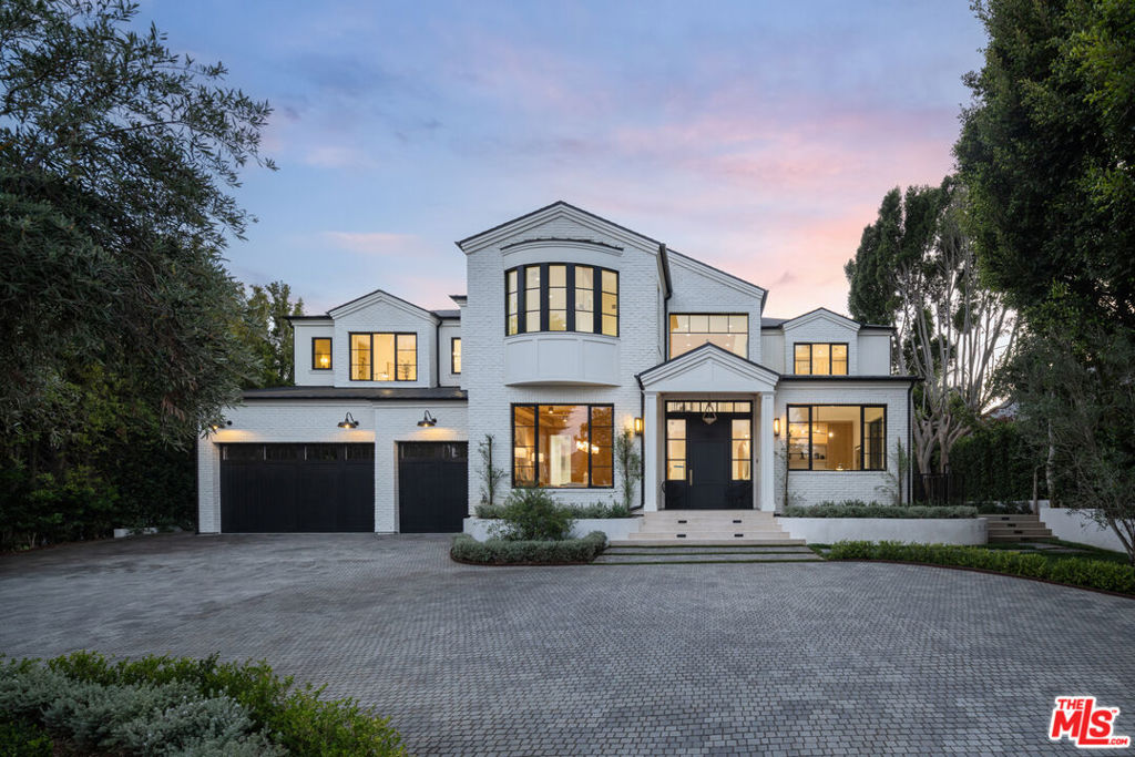 Prime Brentwood Park - Brand New Traditional by Ken Ungar. Exquisite finishes and effortless floorplan. High ceilings and gracious spaces for entertaining. Gourmet kitchen opens to vast double living room and seamlessly to the garden and pool. Wood paneled formal dining, private office, and epic bar. Primary suite with book matched marble bath and dual closets. 6 additional bedrooms each en-suite. Total of 7 bedrooms and 9 baths. Lower level features game room, bar, gym, wellness, cinema and staff accommodations. Large grassy yard with complete privacy and pool pavilion. Hard to find new construction in a most prestigious section of Brentwood Park. A rare offering.
