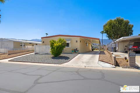 Photo of 38131 Pigeon Springs Drive, Palm Desert, CA 92260 (MLS # 26854399PS)