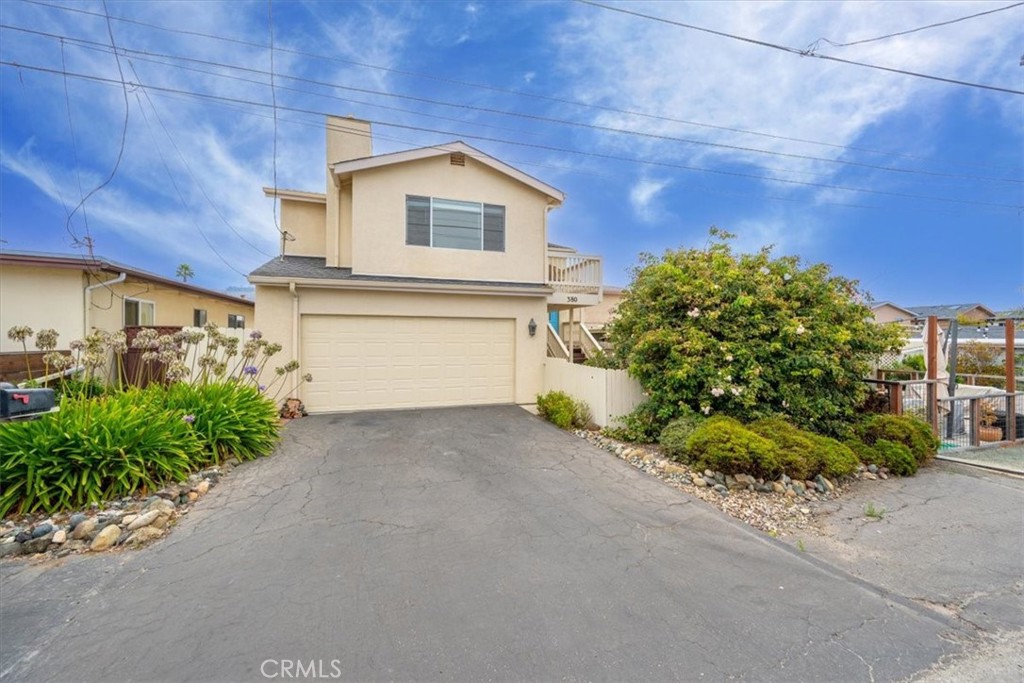 Welcome to your private coastal retreat in North Morro Bay! This 3-bedroom, 2-bath home captures sweeping ocean and iconic Morro Rock views from the balcony—and even lets you wake up to ocean views right from your bed. Perfectly situated, it offers quick access to Highway 1 for effortless trips around town, yet sits far enough back to provide a serene, peaceful setting.
Start your mornings cozied up by the fireplace as the coastal fog drifts in, or unwind in the evenings with sunsets that paint the sky. With its low-maintenance yard, this home allows you to spend more time enjoying the coast and less time on upkeep. Just minutes from Morro Bay’s dog beach, downtown, and charming Cayucos, you’ll enjoy the best of coastal living—where you can check the surf without ever leaving home.