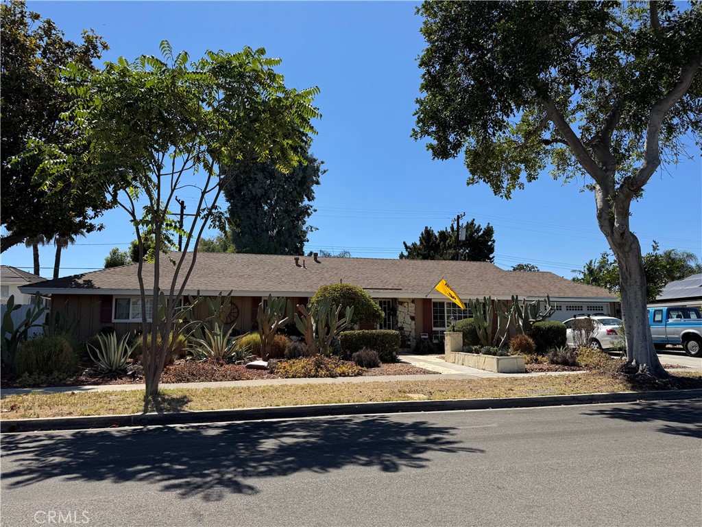 Timeless Comfort in the Heart of Anaheim's Desirable Westmont Neighborhood! Welcome to 609 N. Dwyer Dr, a beautifully maintained single-story home nestled in a serene and desirable Westmont neighborhood. Set on a spacious 10,000 sq ft lot, this inviting residence blends classic mid-century charm with the modern comforts today's homeowners seek. Step inside to discover a thoughtfully designed 3-bedroom, 2-bathroom layout spanning over 2,150 sq ft. The heart of the home features a warm and welcoming living room perfect for relaxing evenings or entertaining guests. A centrally located kitchen offers ample cabinetry and natural light, seamlessly connecting to a large dining room and den with stone fireplace for effortless flow. Enjoy year-round comfort with central heating and air conditioning, and retreat to generously sized bedrooms that offer privacy and tranquility. With new flooring and freshly painted, this home is move-in ready! The large backyard provides endless possibilities—whether you envision a wrap around yard, a pool and jacuzzi, or a beautiful outdoor entertainment space this home offers it all. Additional highlights include an attached 2-car garage, mature landscaping, and a quiet, family-friendly neighborhood just minutes from schools, parks, shopping, and freeways. Whether you're upsizing, downsizing, or simply searching for a forever home with space to grow, 609 N. Dwyer Dr delivers unmatched potential and timeless appeal in the heart of Orange County.