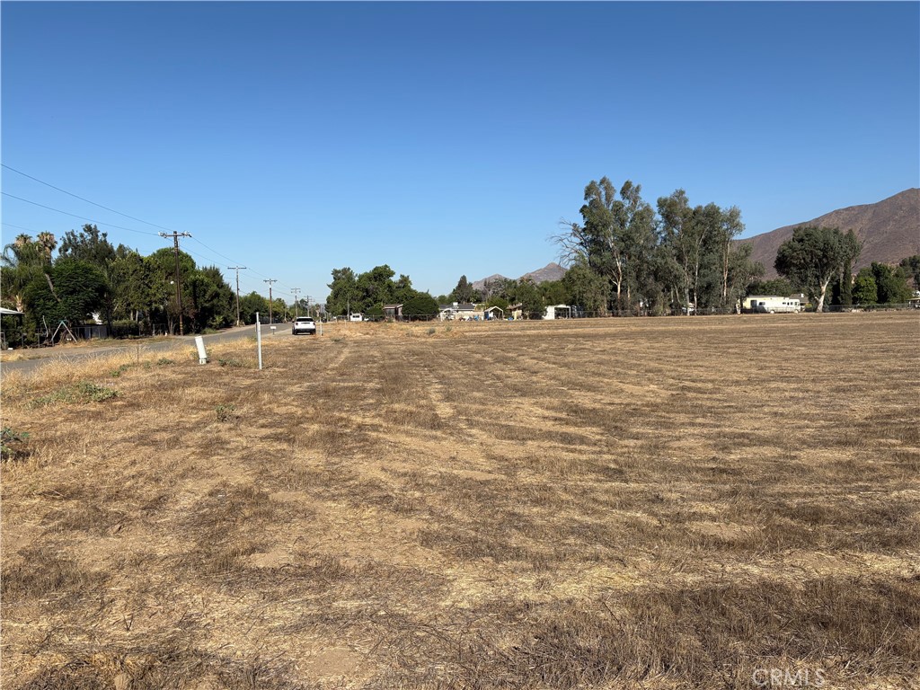 Introducing a vacant lot located at 9th Street, Winchester, CA 92596, identified by APN 463-030-011, spanning 0.96 acres. Situated in a serene and evolving area of Winchester—an 8-square-mile community set amid picturesque Inland Empire hills approximately 8 miles southwest of Hemet, these lots benefit from water and power available at the street, offering a rare blank canvas with key infrastructure in place. Located within reach of the 215 Freeway and nearby amenities, they position future owners for both convenience and country charm. Don’t miss this opportunity to claim a substantial portion of Winchester’s tranquil landscape. Seller also has for sale the property next door APN 463-030-010 ****No soils reports, surveys, etc., have been done. Buyer and buyer's agent to verify all information with the city or county for allowable uses and requirements and rely on their own investigations. **Buyer responsible for checking zoning, utilities, permits and exact property boundaries. ****