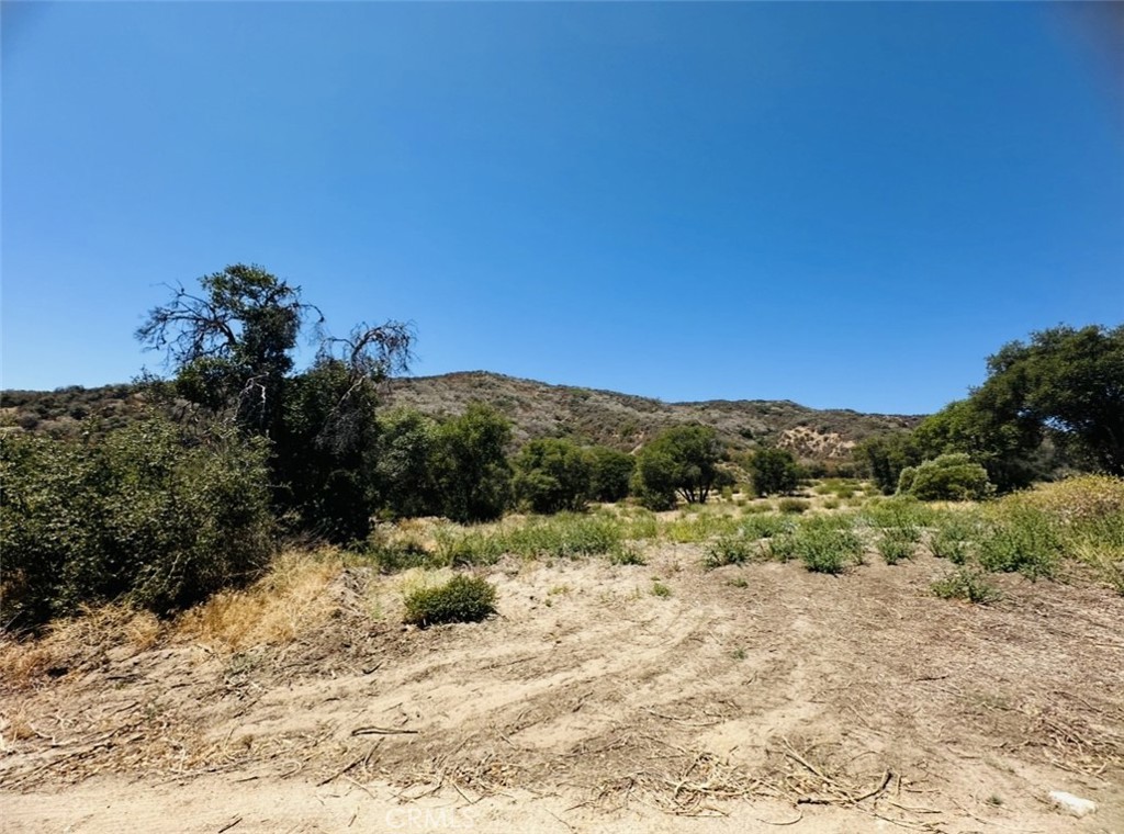 Discover possibility at this expansive 20-acre parcel in Banning, CA—where serene landscapes meet flexibility, and vision is unlimited. Perfectly perched at the base of the San Gorgonio Range with private road access and sweeping western vistas, this land is ideal for a bespoke ranch, equestrian haven, or tranquil multigenerational retreat. Just minutes from I-10, this location delivers rural privacy without sacrificing proximity to shopping, dining, and regional destinations like Morongo Casino and the resorts beyond. Whether you're dreaming of horse pastures, workshop barns, or panoramic home sites, this parcel is primed for bold development and refined living.